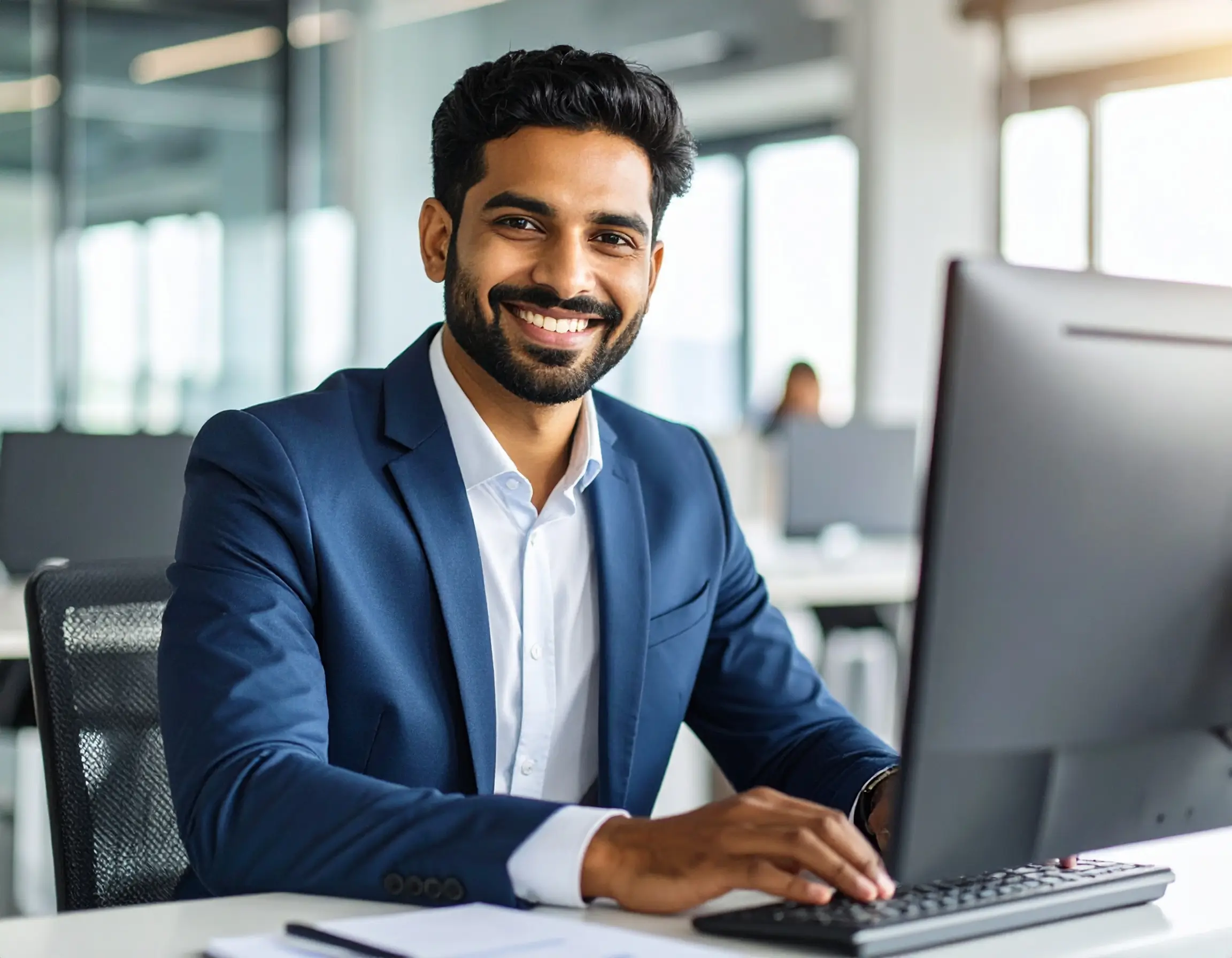 Office workers collaborating in a modern workspace